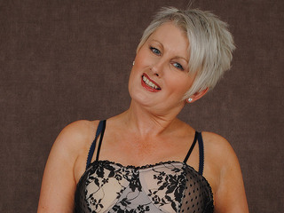 Hot British MILF works her pussy hard
