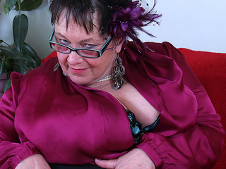 Huge breasted British mature BBW playing all by herself