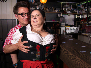 Big breasted German waitress having fun with the beerfesten