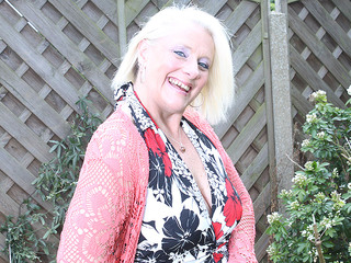 Naughty British housewife playing in the garden