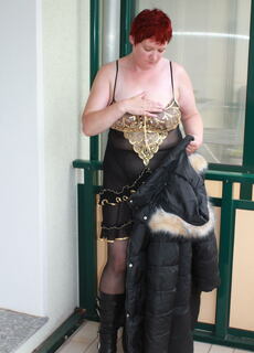 Naughty housewife playing on her balcony at Mature.nl