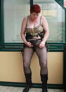Naughty housewife playing on her balcony at Mature.nl