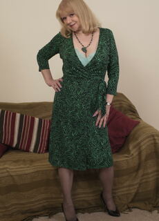 Horny British housewife teasing and pleasing at Mature.nl