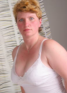 This horny housewife gets playfull and nasty at Mature.nl